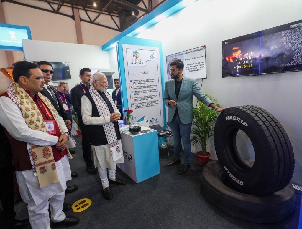 PM Modi interacting with Jaipur based startup Regrip at Rising Rajasthan Summit.